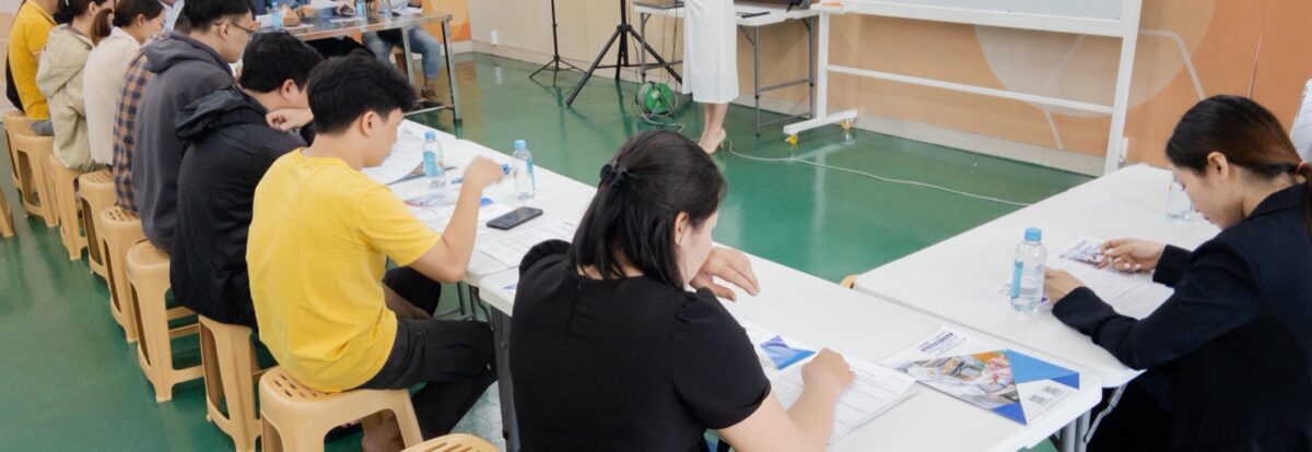 Participants working through course material in the Ho Chi Minh City classroom