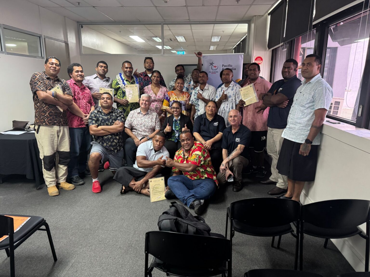 An Australian Meat School cohort in Fiji holding their certificates